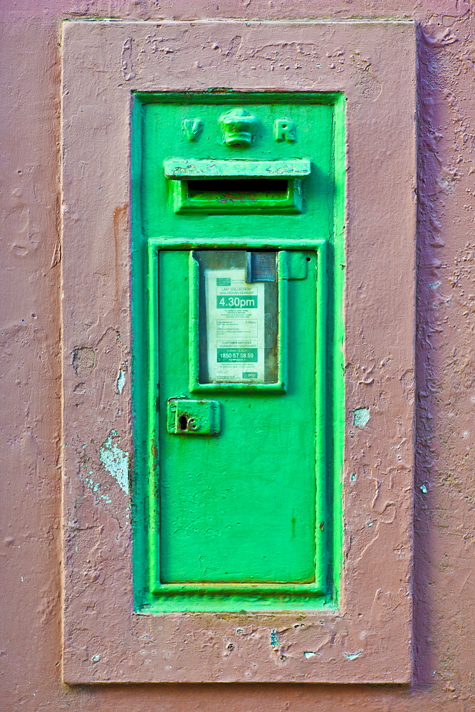 Postbox from the time of Queen Victoria with cypher VR in Kinsale, County Cork, Ireland