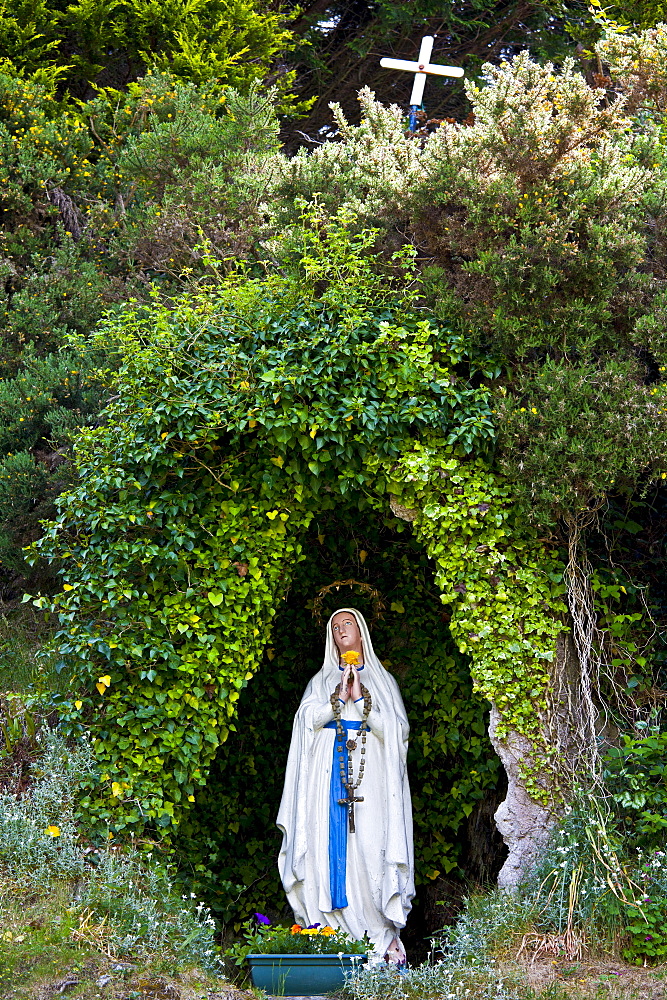 Grotto with statue of the Virgin Mary and The Immaculate Conception at Ballinspittle near Kinsale, County Cork, Ireland