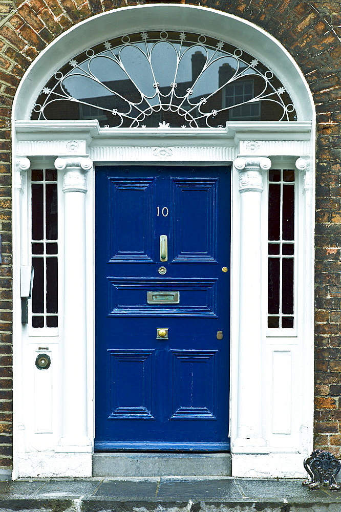 Stylish front door of Georgian townhouse with fanlight window in Limerick City, County Limerick, Ireland