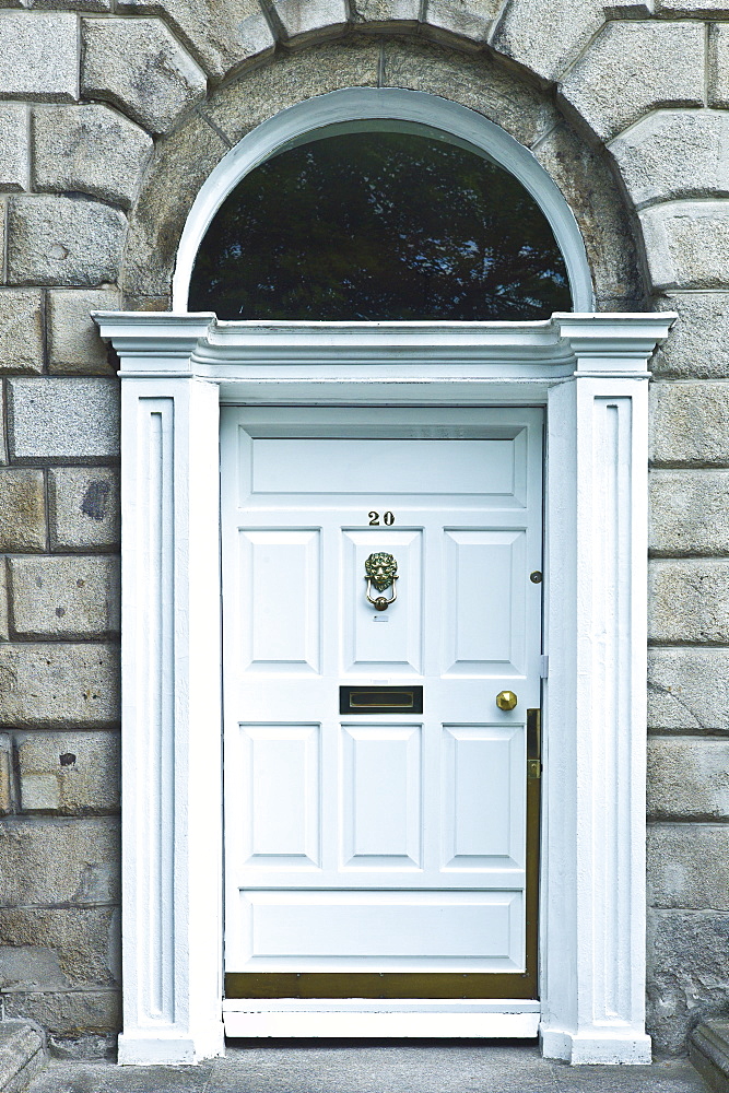 Traditional doorway with fanlight windows in Merrion Square famous for its Georgian architecture, Dublin, Ireland