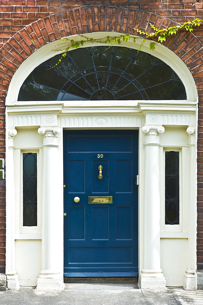 Traditional doorway with fanlight windows in Merrion Square famous for its Georgian architecture, Dublin, Ireland