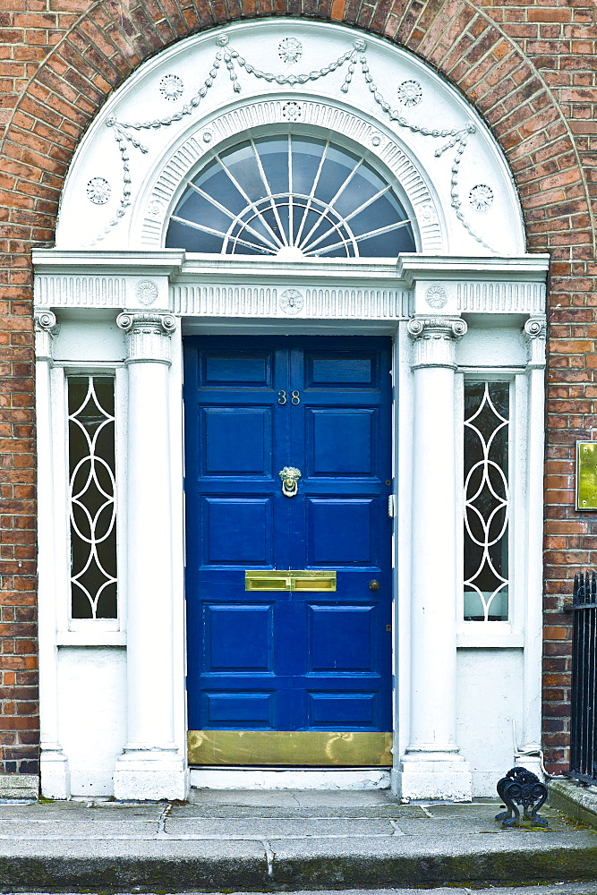 Traditional doorway with fanlight windows in Merrion Square famous for its Georgian architecture, Dublin, Ireland