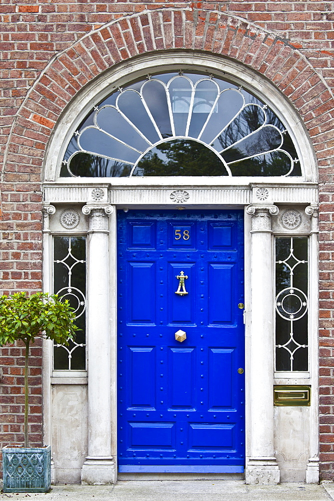 Traditional doorway with fanlight windows in Merrion Square famous for its Georgian architecture, Dublin, Ireland