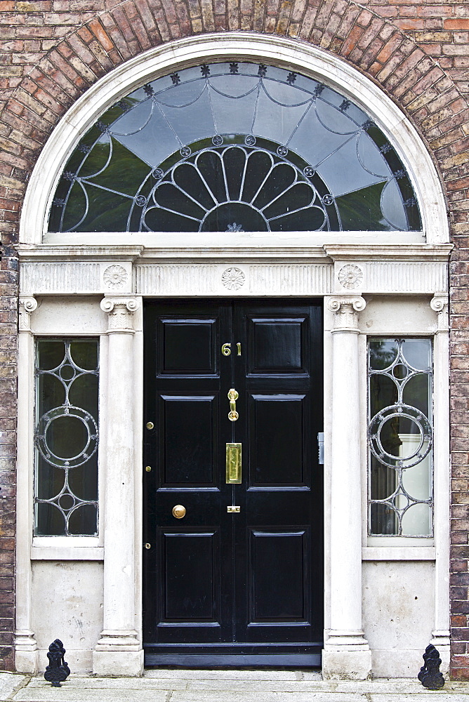 Traditional doorway with fanlight windows in Merrion Square famous for its Georgian architecture, Dublin, Ireland