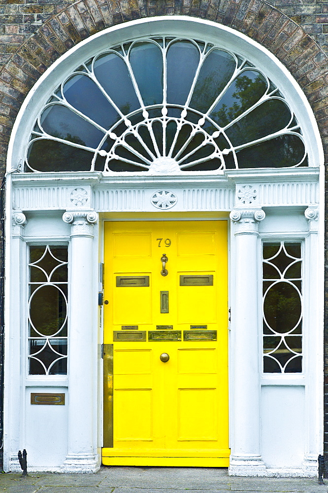 Traditional doorway with fanlight windows in Merrion Square famous for its Georgian architecture, Dublin, Ireland