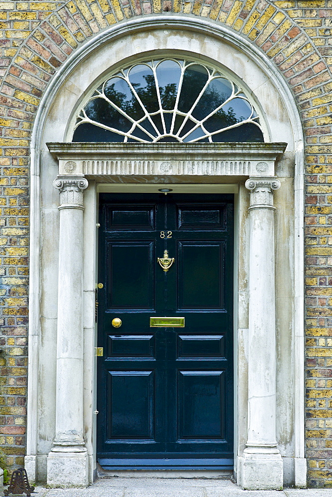 Traditional doorway with fanlight windows in Merrion Square famous for its Georgian architecture, Dublin, Ireland