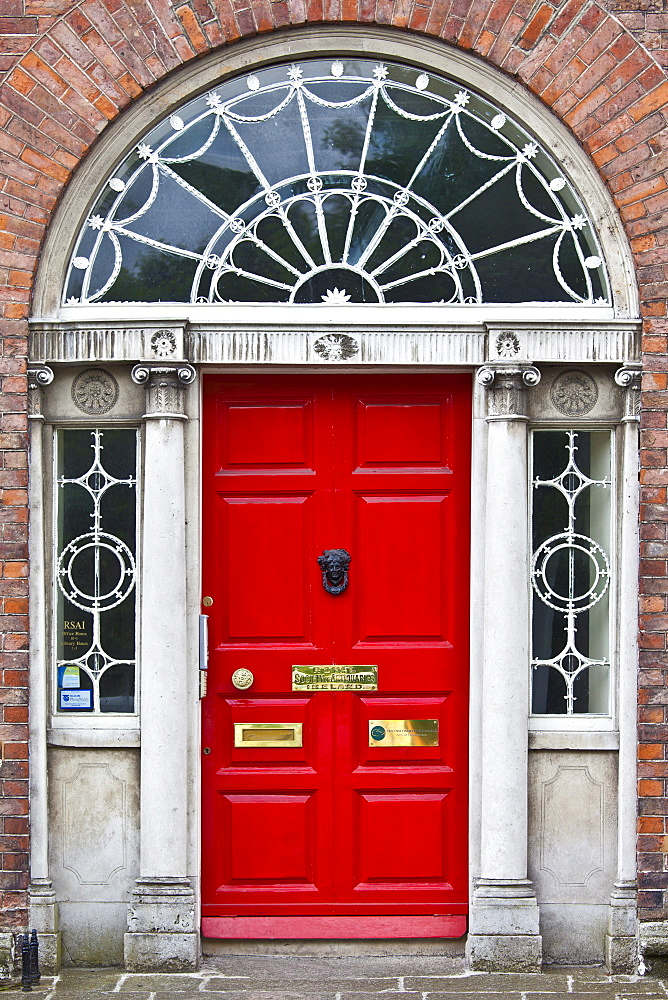 Traditional doorway with fanlight windows in Merrion Square famous for its Georgian architecture, Dublin, Ireland