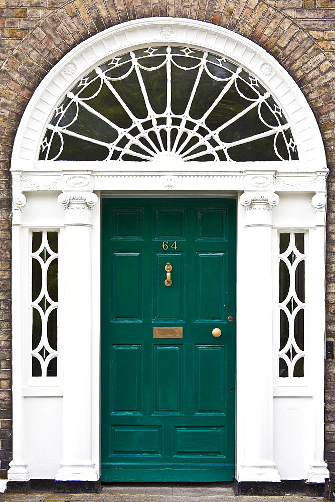 Traditional doorway with fanlight windows in Merrion Square famous for its Georgian architecture, Dublin, Ireland