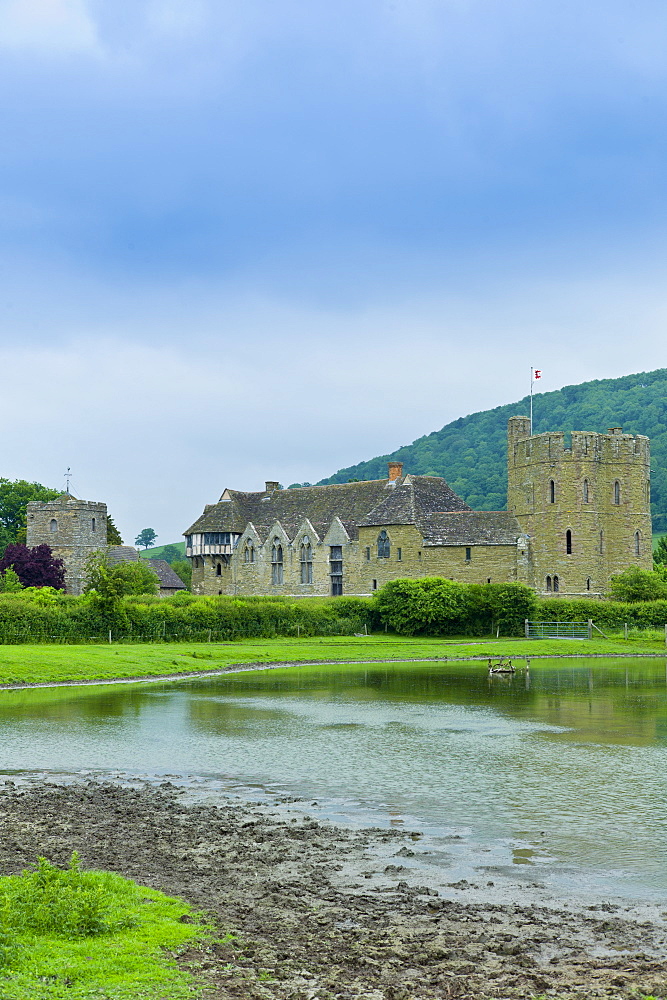 Stokesay Castle and church, fortified medieval manor with timber framed gatehouse, in Shropshire, England