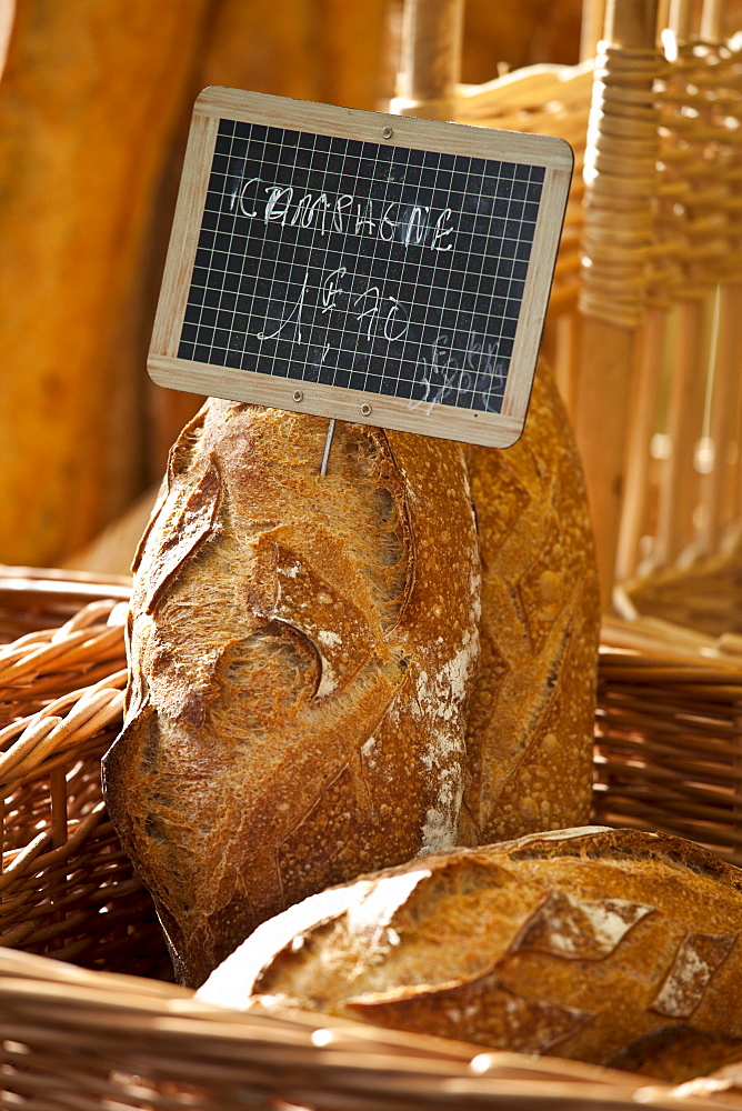 Fresh French bread, pain Campagne, on sale for 1 euro 70 at food market at La Reole in Bordeaux region of France