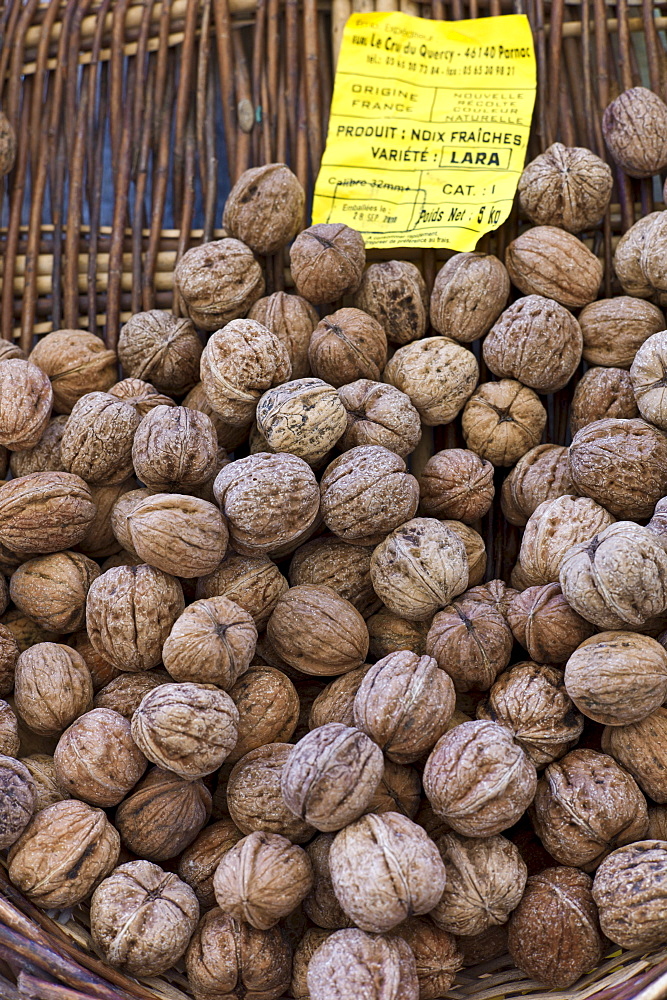 Fresh walnuts on sale at food market at La Reole in Bordeaux region of France