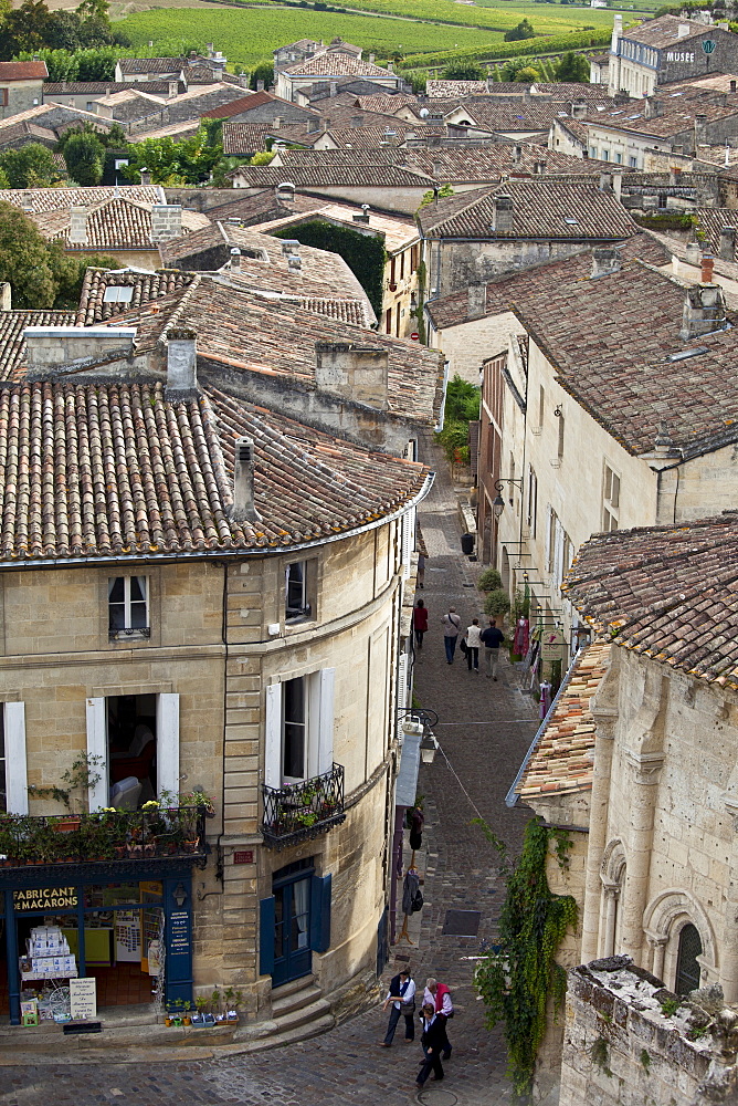 View of tourists strolling in St Emilion from L'Eglise Monolith, Monolithic church, in the Bordeaux region of France