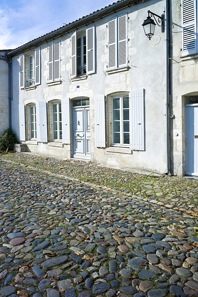 Cobbled stones street scene at St Martin de Re,  Ile de Re, France