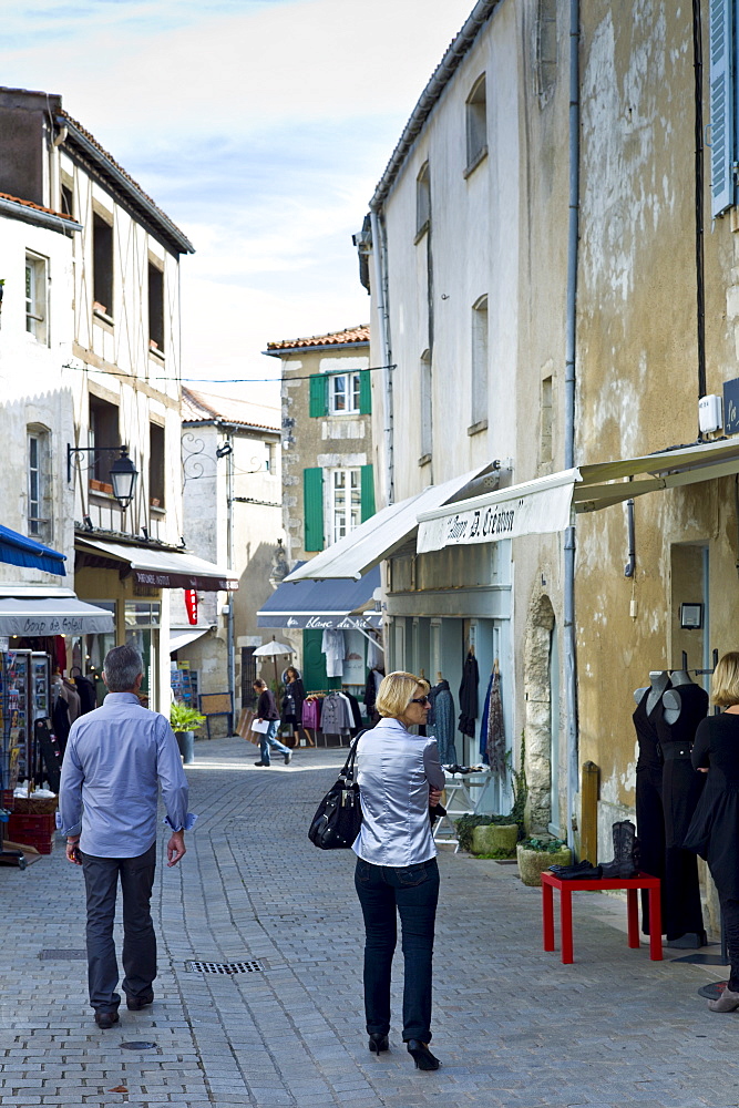 Street scene tourists shopping at St Martin de Re,  Ile de Re, France