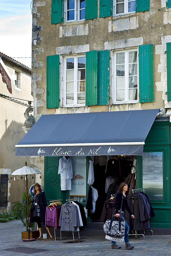 Street scene fashion clothes shop Blanc de Nil at St Martin de Re, Ile de Re, France