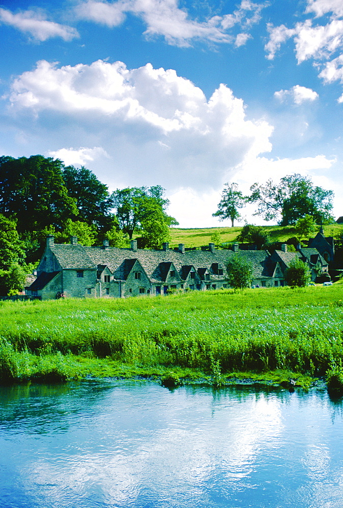 Arlington Row cottages in Bibury in the Cotswolds, Gloucestershire, England