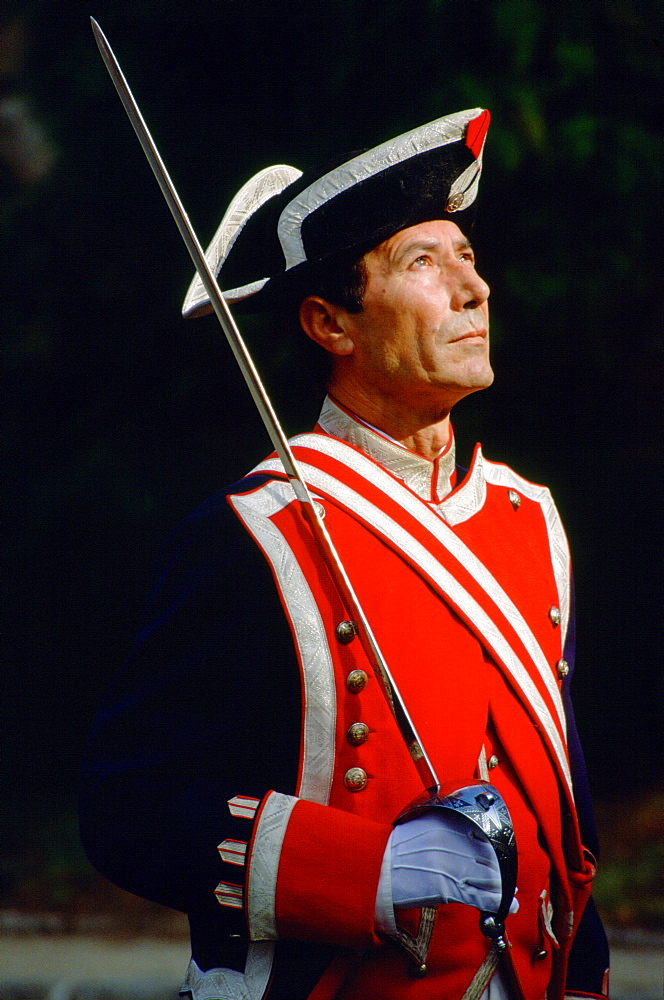 Ceremonial guard with spear at the Alcazar Palace in Seville, Spain