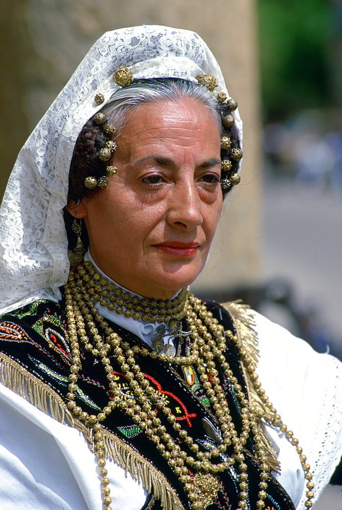 Dancer in national dress wearing lace mantilla and gold beads in Salamanca, Spain