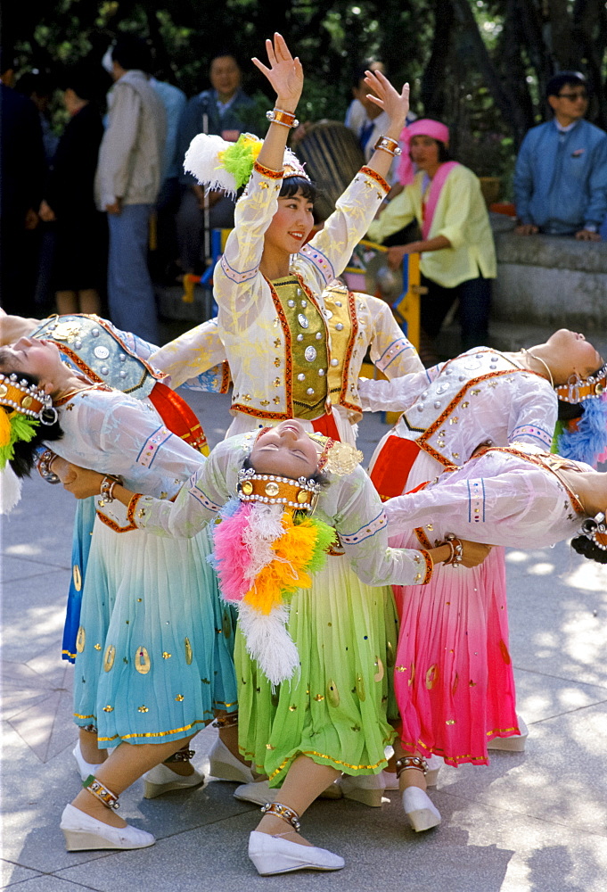 Chinese women performing dance display at Kunming, China