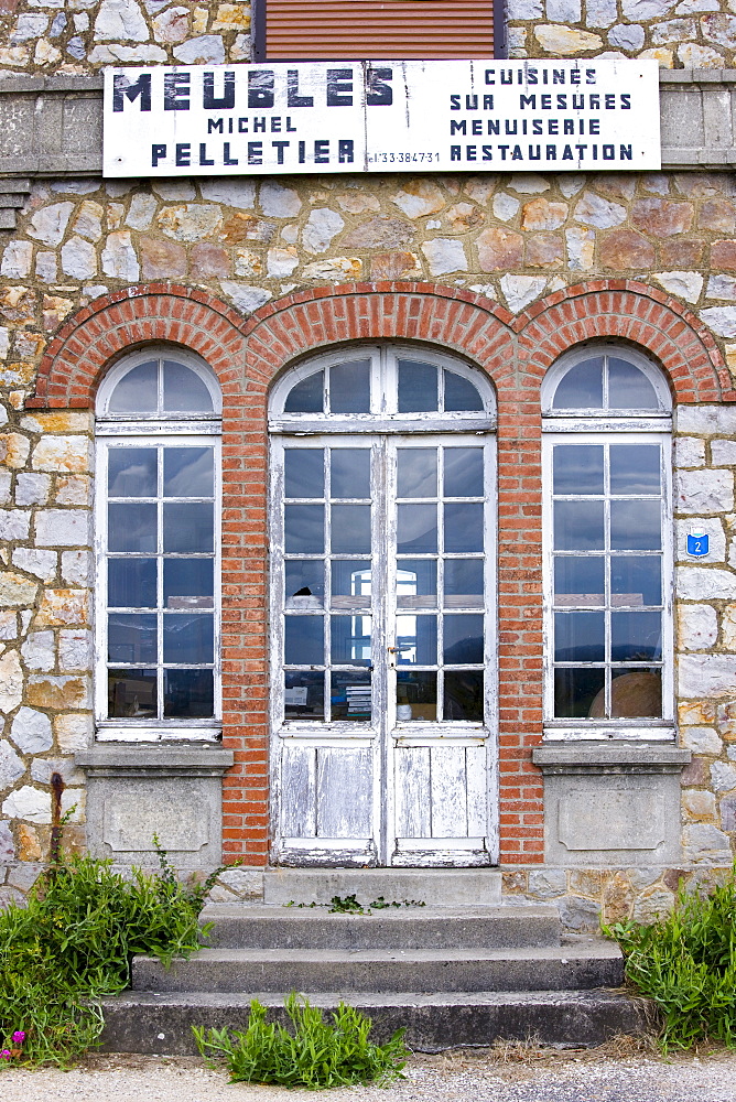 Meubles furniture shop in Domfront medieval town, Normandy, France