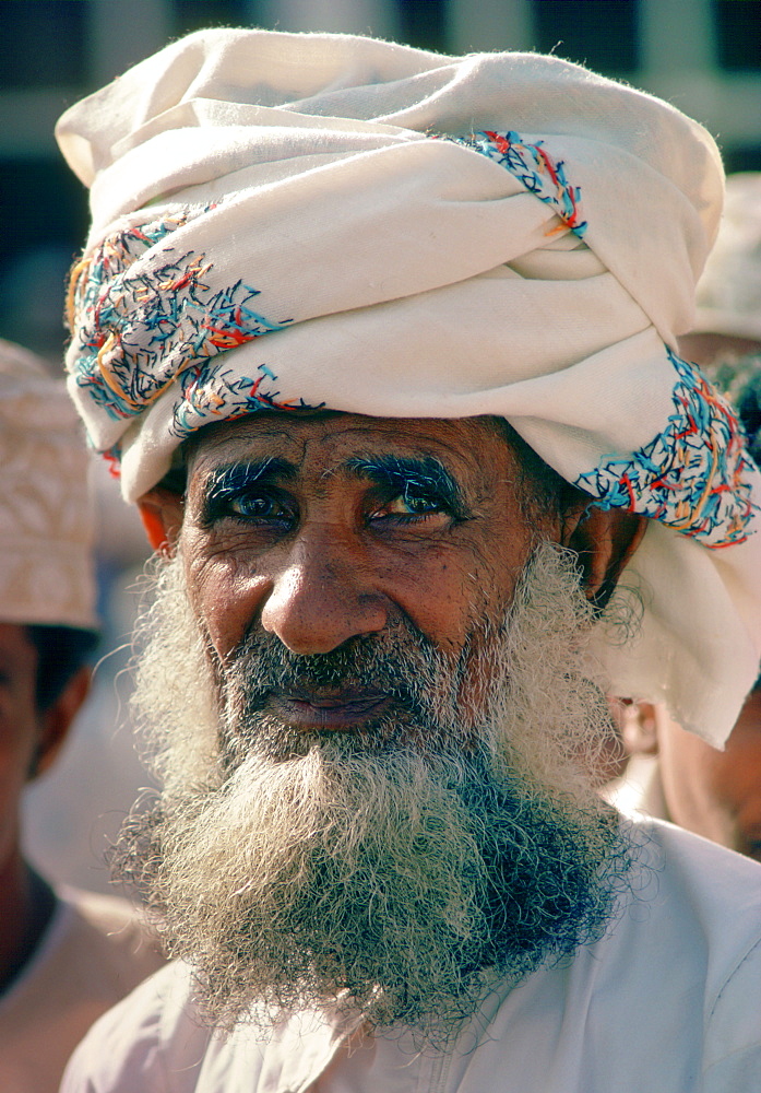 An Omani man with grey beard and moustache in Oman