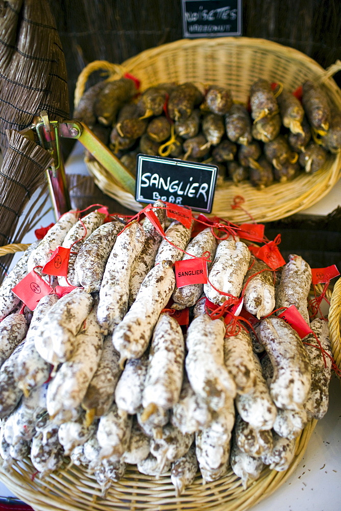 Sanglier boar sausages saucisson on sale in Brantome in North Dordogne, France