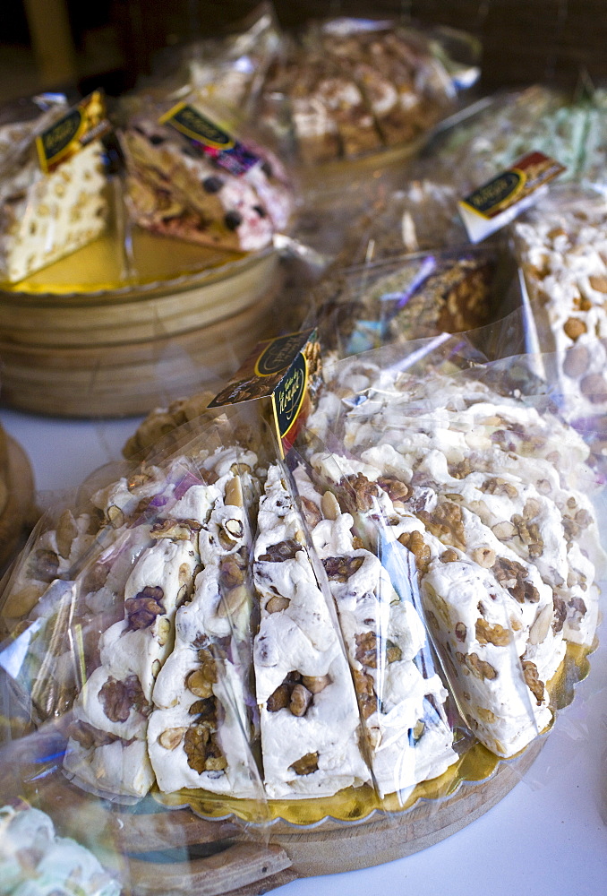 Tarte de Nougat Tendre sweet cakes on sale in Brantome in North Dordogne, France