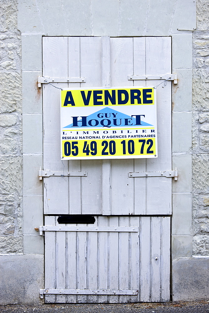 For Sale sign on period property at Serigny in the Loire Valley, France