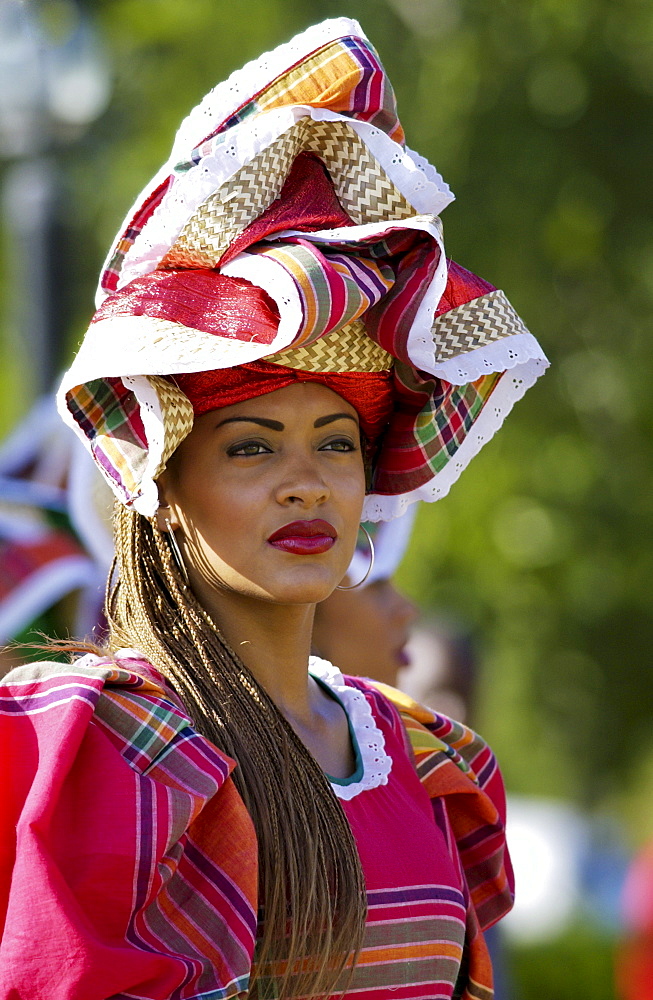 Woman wearing Jamaican national costume for cultural display at Governor General's Residence, Kings House, Kingston, Jamaica