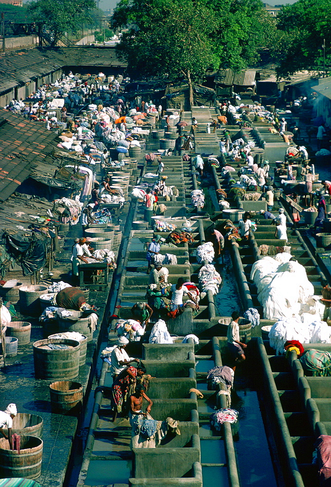 People at work at open air laundry, Bombay, India