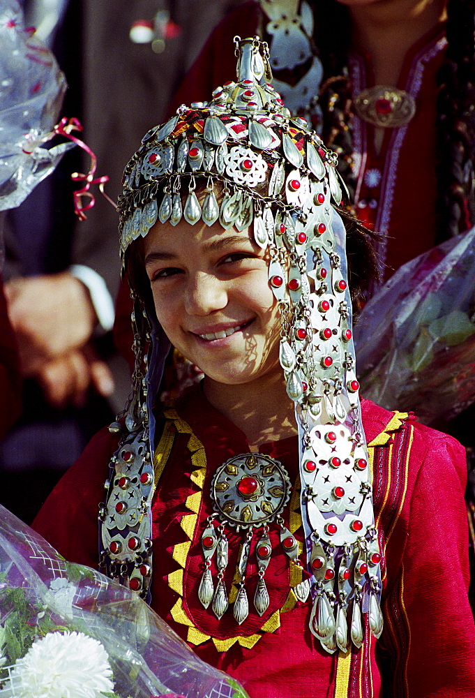 Girl wearing national costume in town of Mary in Turkmenistan