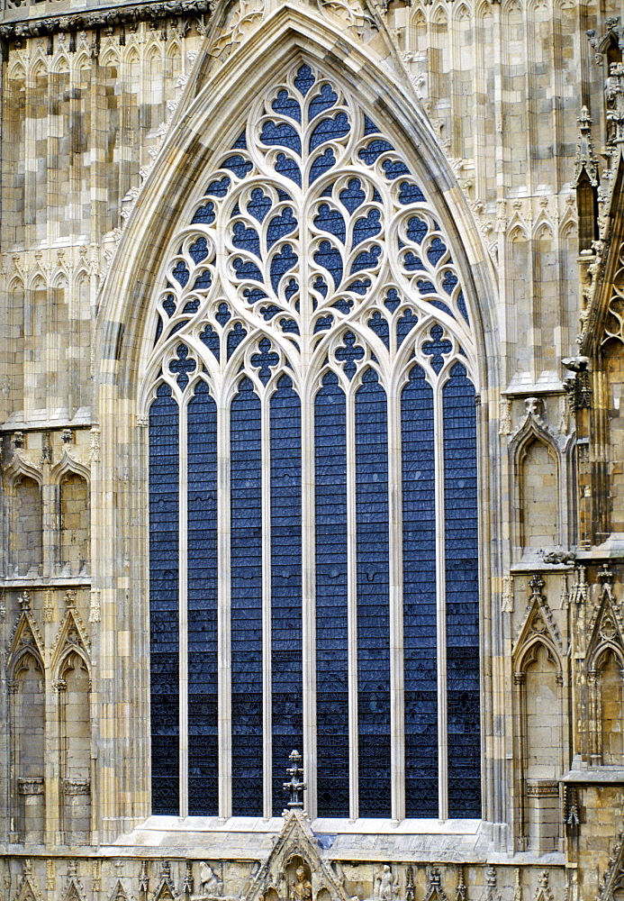 Restored west window of York Minster cathedral in heart of York design tracery after fire in 1984, UK