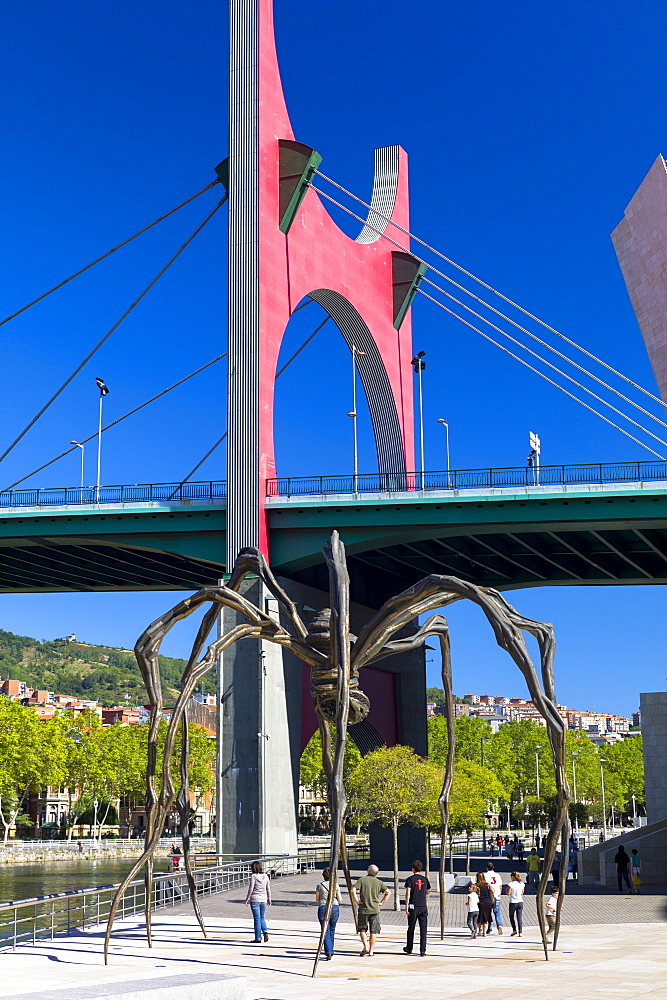 The Red arches by artist Daniel Buren at La Salve Bridge, Maman spider by Louise Bourgeois at Guggenheim in Bilbao, Basque country, Euskadi, Spain, Europe