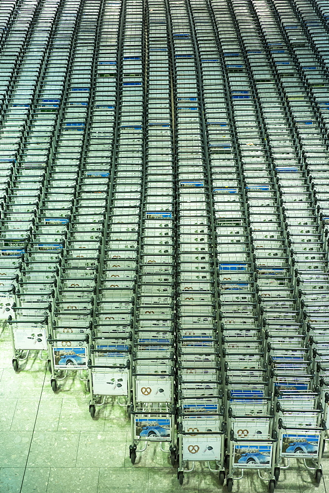 Generic shot of hundreds of luggage trolleys at an airport, United Kingdom, Europe