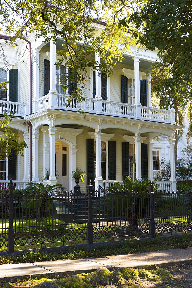 Neo-classical clapboard grand house with double gallery and columns in the Garden District, New Orleans, USA