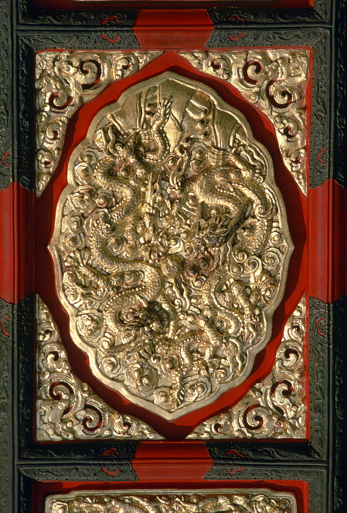 Ornate door panel in the Forbidden City, Beijing, China