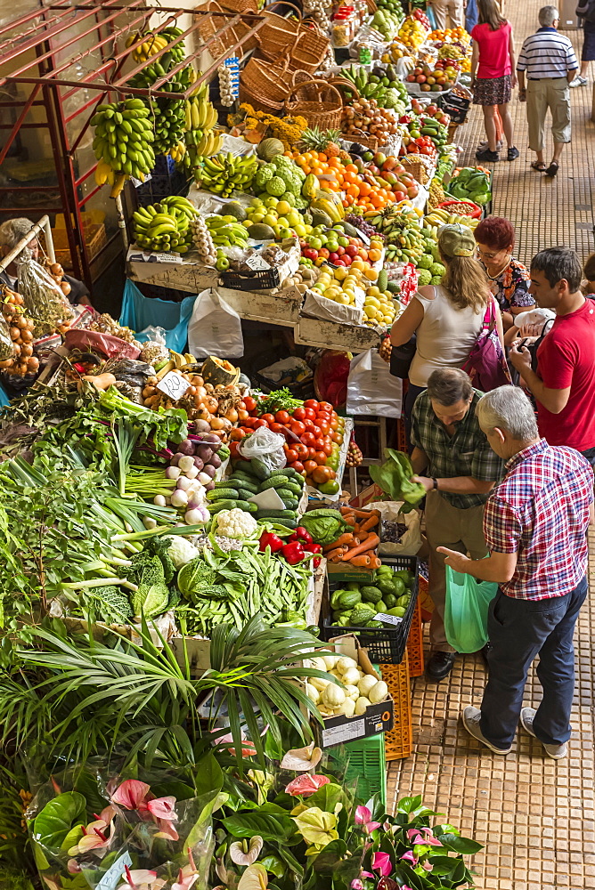 Shoppers at stalls with fresh produce, Mercado Dos Lavradores (Farmers' Market), Funchal, Madeira, Atlantic, Portugal, Europe