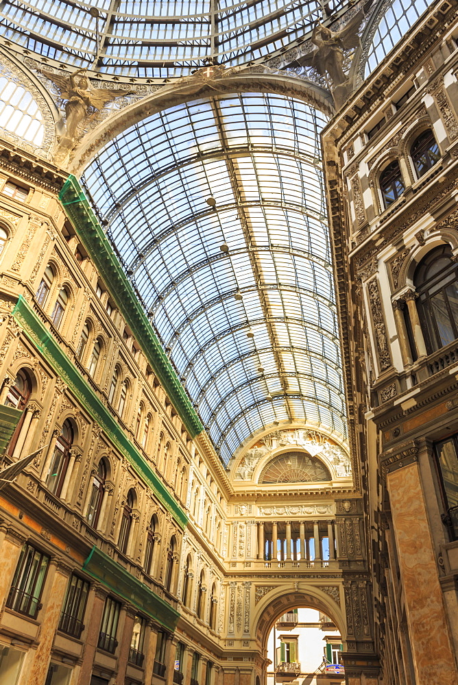 Morning light illuminates the Galleria Umberto I arcade, 1890, through its spectacular glass vaulted roof, City of Naples, Campania, Italy, Europe