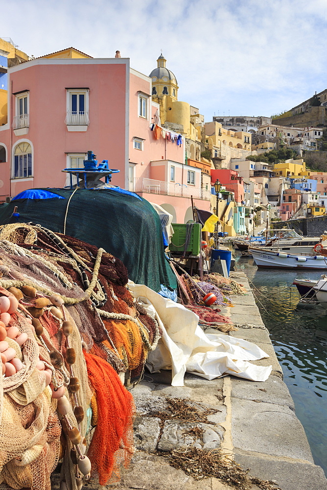 Marina Corricella, pretty fishing village, colourful fishermen's houses, and fishing nets, Procida Island, Bay of Naples, Campania, Italy, Europe