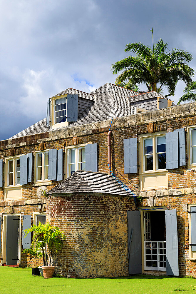 Nelsons Dockyard, palm trees, Admirals Inn, historic restoration of Copper and Lumber Store, English Harbour, Antigua, Antigua and Barbuda, Leeward Islands, West Indies, Caribbean, Central America