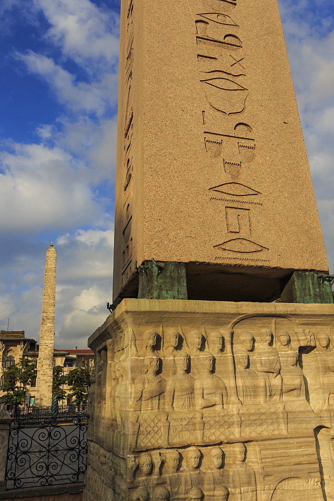 Egyptian Obelisk hieroglyphics and Brazen Column, Hippodrome, August early morning, Sultanahmet District, Istanbul, Turkey, Europe