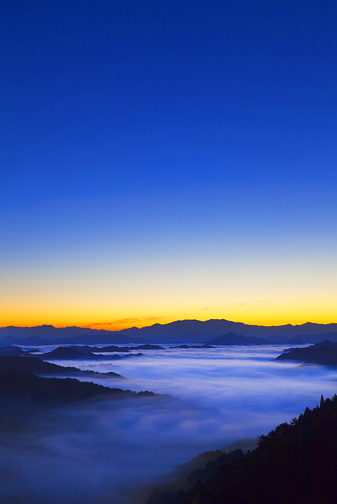 Sunrise behind Mountains and Sea of Clouds, Nara Prefecture, Japan