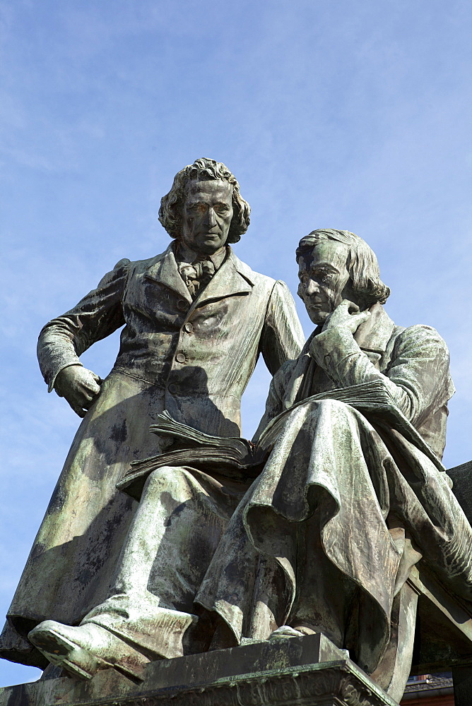 Bronze figures of the Brothers Grimm in Hanauâ€™s City Hall, Hesse, Germany