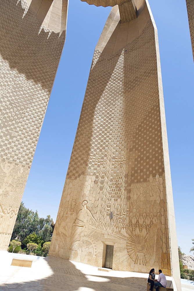 Couple sitting at Aswan High Dam, Egypt