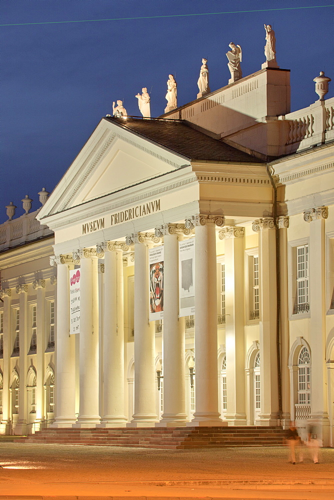 Facade of Fridericianum illuminated in evening, Kassel, Hessen, Germany