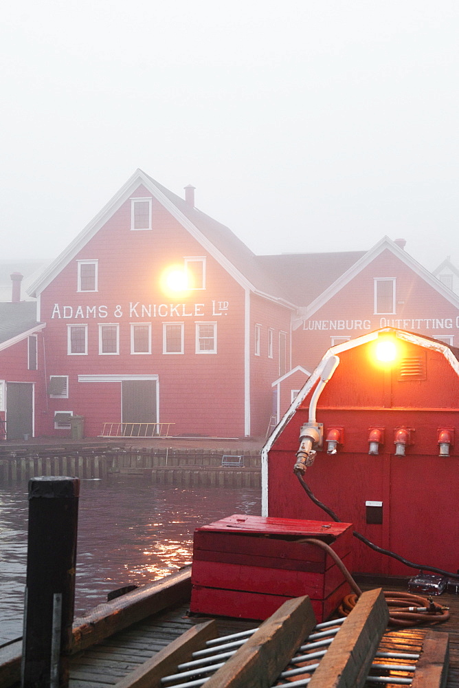 Fog in morning light at Lunenburg Harbour, Nova Scotia, Canada