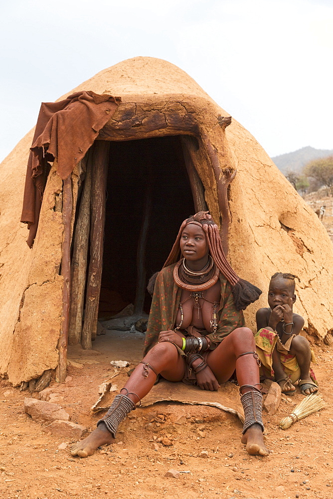 A mother and child in a Himba village, indigenous tribe, Kunene, Namibia