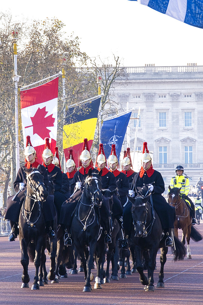 Guardsmen of the Blues and Royals regiment of the Queen's Life Guards riding along The Mall in front of Buckingham Palace, London, England, United Kingdom, Europe