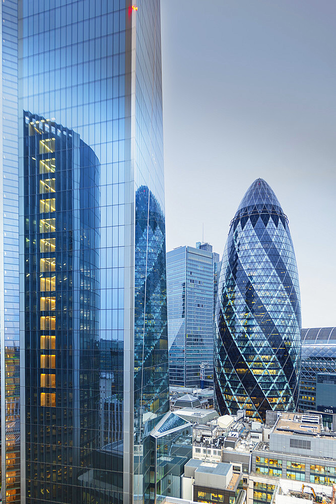 The City of London financial district skyline showing the Scalpel building (52-54 Lime Street) and the Gherkin (30 St. Mary Axe), London, England, United Kingdom, Europe