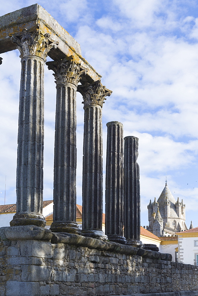 The Roman Temple of Diana and the tower of Evora Cathedral, historic centre, Evora, UNESCO World Heritage Site, Alentejo, Portugal, Europe